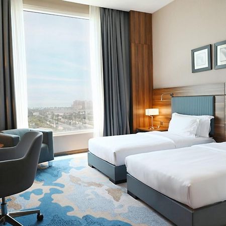 Bay La Sun Hotel And Marina - Emaar King Abdullah Economic City Dış mekan fotoğraf A room at the hotel
