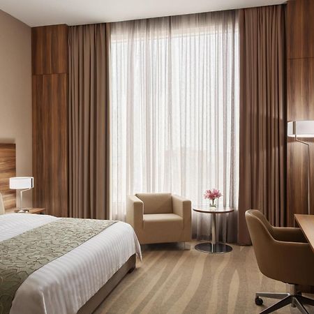 Bay La Sun Hotel And Marina - Emaar King Abdullah Economic City Dış mekan fotoğraf A room at the hotel