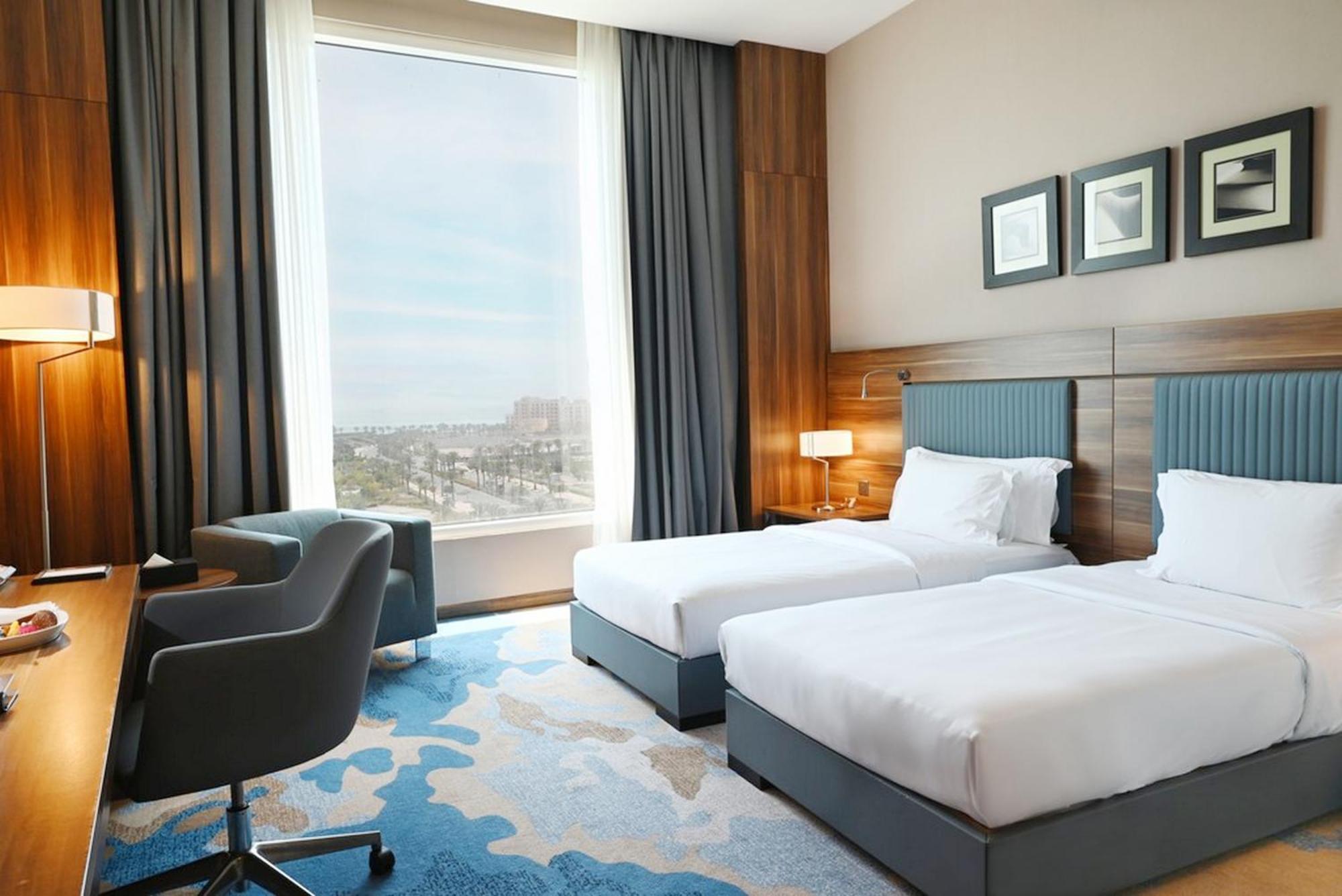 Bay La Sun Hotel And Marina - Emaar King Abdullah Economic City Dış mekan fotoğraf A room at the hotel
